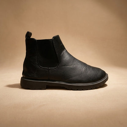 black faux leather Chelsea boots