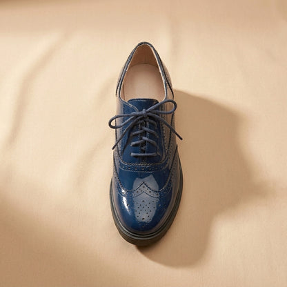 navy patent leather brogues