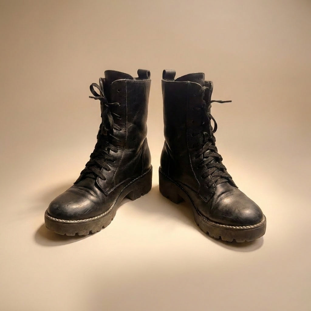 Black leather Vic Matié combat boots