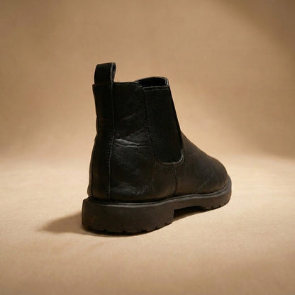 black faux leather Chelsea boots