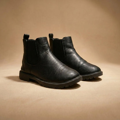 black faux leather Chelsea boots